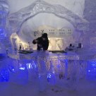 Bartender mixing drinks at the N'Ice Bar, Hotel des Glaces